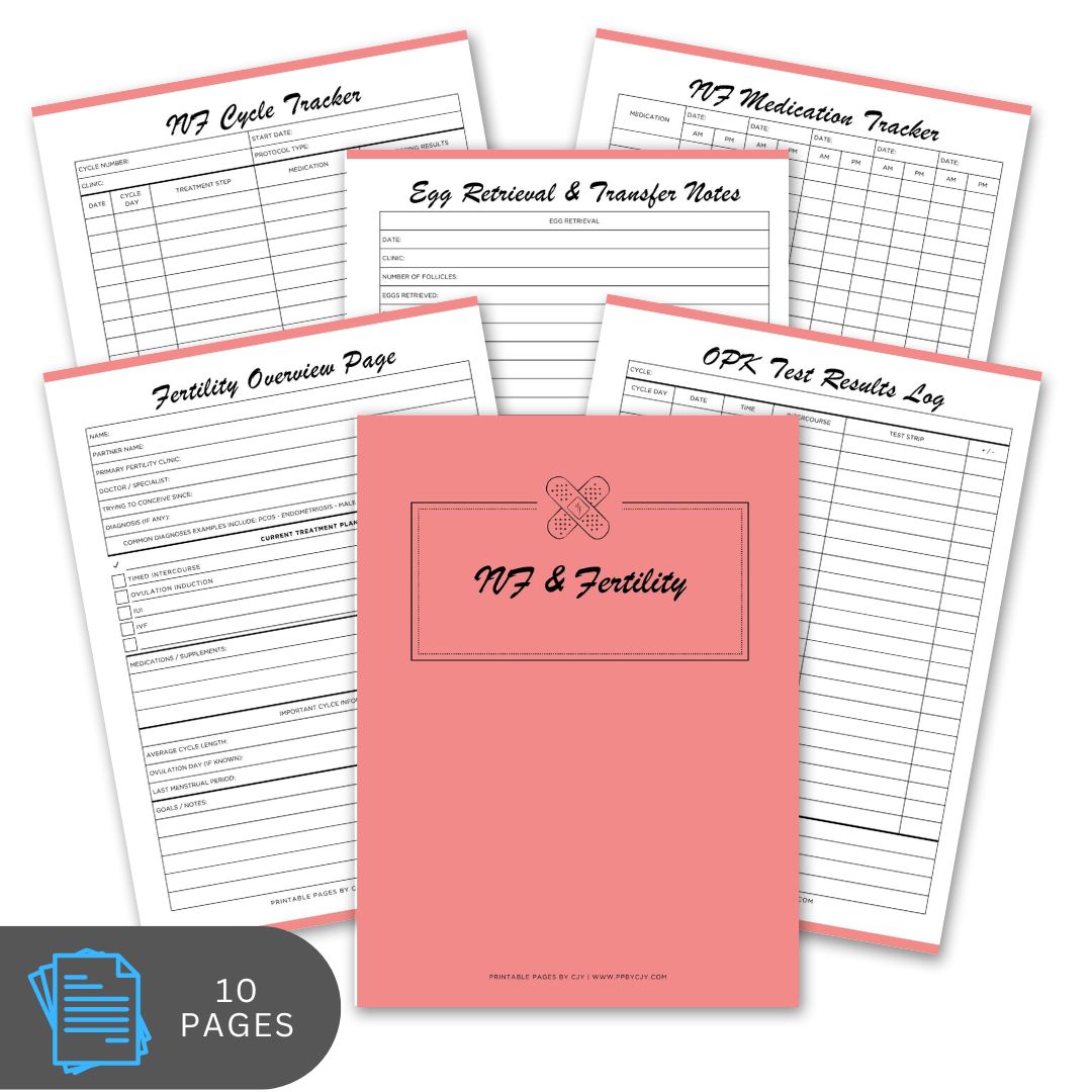 Pink notebook with fertility tracking pages on a white background