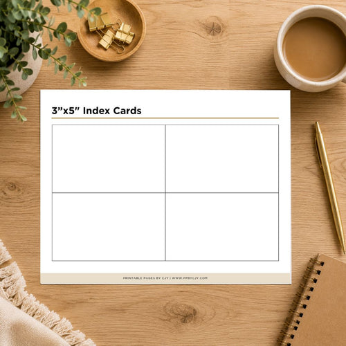 A printable planner insert labeled '3"x5" Index Cards' shown on a wooden desk with a coffee cup, plant, binder clips, pen, and notebook around it. The insert has a white background with a four-column grid layout.