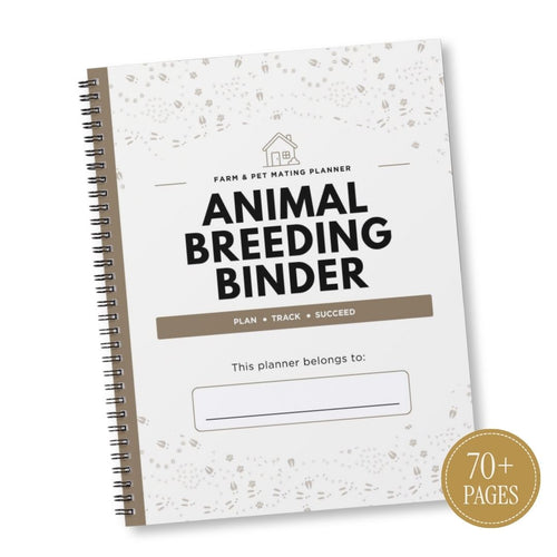 A spiral-bound planner titled 'Animal Breeding Binder' shown at an angle on a white background. The cover is white with subtle gray speckles, black text, and a taupe-brown banner.