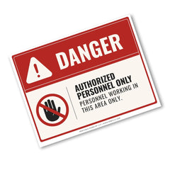 A rectangular warning sign with a red header reading DANGER, an exclamation mark icon, and a crossed-out hand symbol. The sign also reads AUTHORIZED PERSONNEL ONLY / PERSONNEL WORKING IN THIS AREA ONLY.