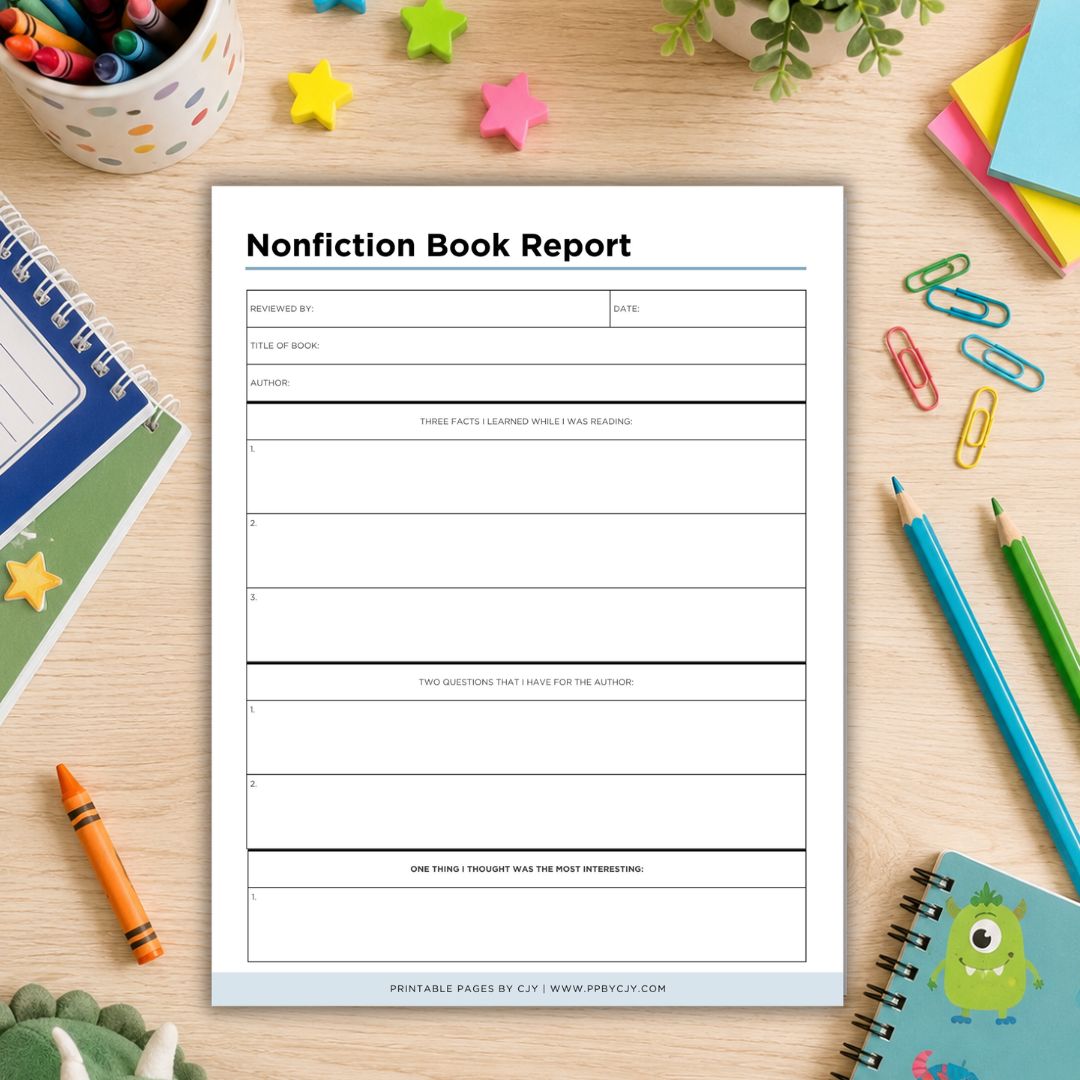 A printable nonfiction book report worksheet page laid flat on a light wood desk, surrounded by school supplies including notebooks, pencils, paper clips, crayons, and star stickers.