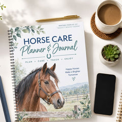 A spiral-bound Horse Care Planner & Journal lies on a white tabletop, surrounded by a coffee cup, pen, smartphone, and small potted succulent. The cover shows a brown horse portrait with the title 'HORSE CARE Planner & Journal' and decorative greenery.