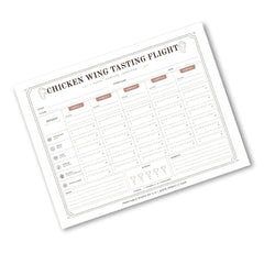 A printable chicken wing tasting flight chart template on a white background, angled diagonally. The chart features columns for date, temperature, and scores across various flavor profiles like crispy, juicy, and well-seasoned.