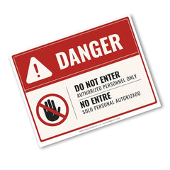 A rectangular warning sign with a red header reading DANGER, plus a warning icon and a crossed-out hand symbol. Text on the sign reads 'DO NOT ENTER', 'AUTHORIZED PERSONNEL ONLY', and 'NO ENTRE / SOLO PERSONAL AUTORIZADO'.