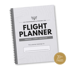 A spiral-bound 'Flight Planner' notebook for UAV maintenance and mission logging, featuring a light gray wood-grain patterned cover with bold black text and a gold '20+ PAGES' seal in the bottom right corner.