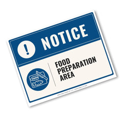 A rectangular food safety notice sign with a blue header reading 'NOTICE' and a white lower section that says 'FOOD PREPARATION AREA,' plus a blue icon of a cutting board and food. The sign is shown at an angle on a plain white background.