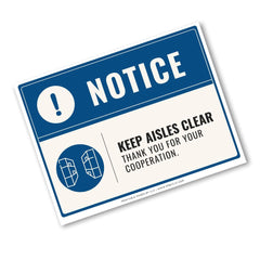 A rectangular warning sign with a blue header reading 'NOTICE' and a cream background with the text 'KEEP AISLES CLEAR THANK YOU FOR YOUR COOPERATION.' Two small aisle icons appear in blue circles.