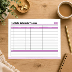 A printable 'Multiple Sclerosis Tracker' sheet laid flat on a wooden desk with a coffee cup, plant, gold clips, pen, and notebook around it. The tracker has purple header accents and table lines.