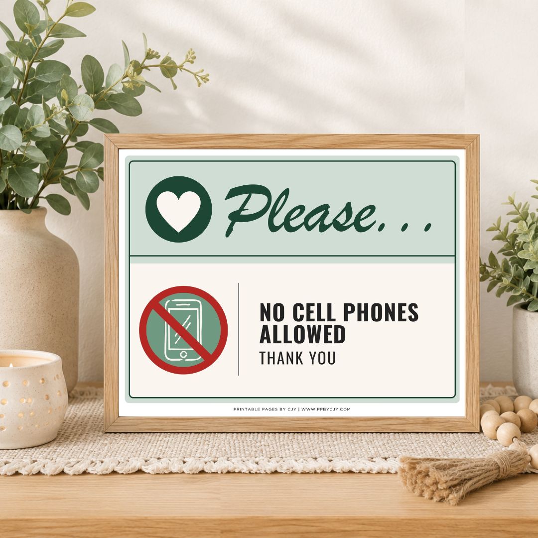 A framed printed sign on a tabletop in a styled interior setting. The sign reads 'Please.