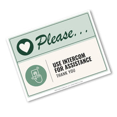 A printed sign with a white border and a pale green header reading 'Please use intercom for assistance.