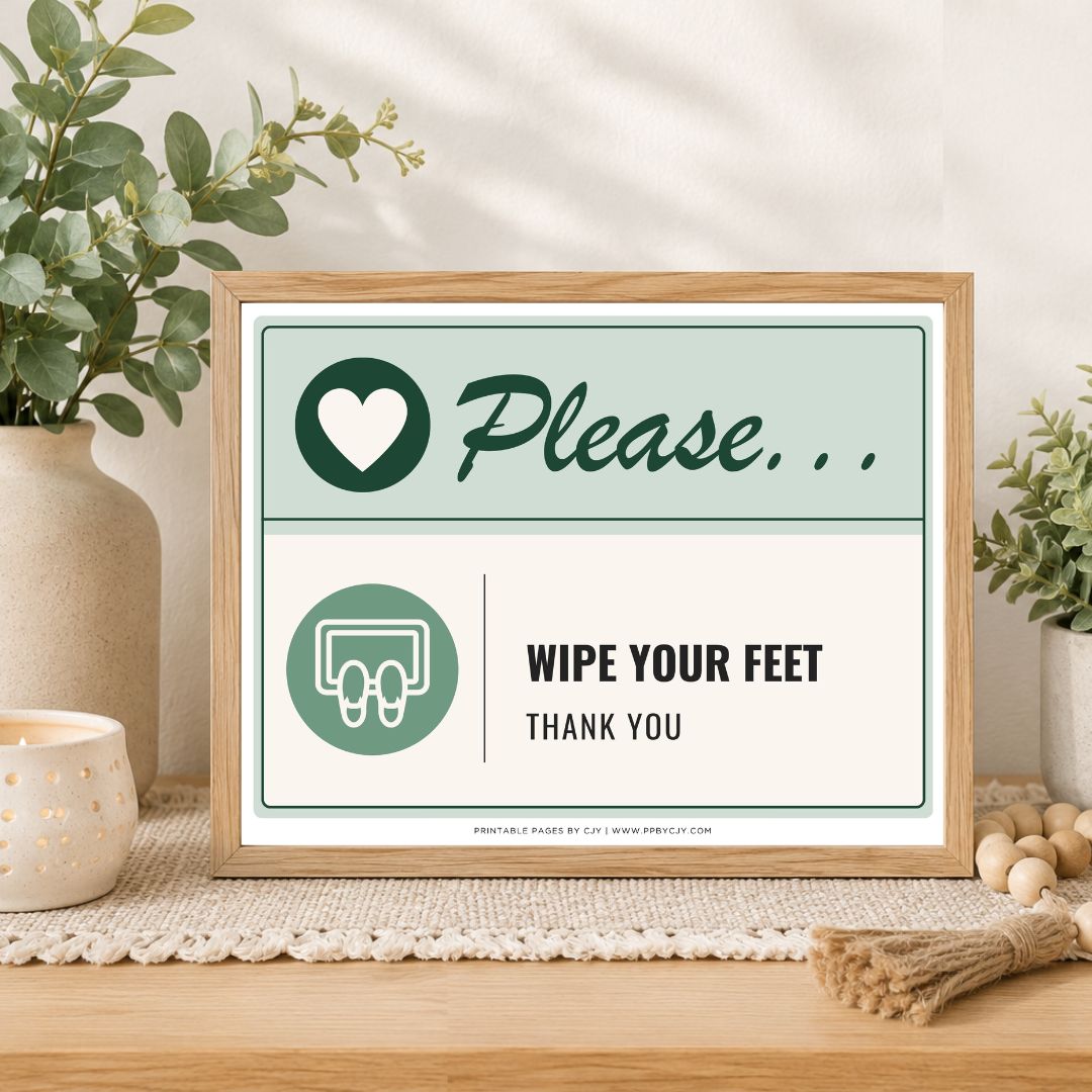 A framed novelty sign on a wooden table in a styled home setting, featuring a light wood frame, a sage green and white background, and the text 'Please.