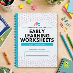 A spiral-bound workbook titled 'Early Learning Worksheets' lies on a light wood desk surrounded by school supplies, including colored pencils, paper clips, star stickers, crayons, and another notebook.