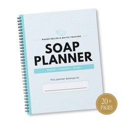 A spiral-bound Soap Planner notebook with a light blue cover, black text, and a gold circular badge in the corner that reads '20+ PAGES'.