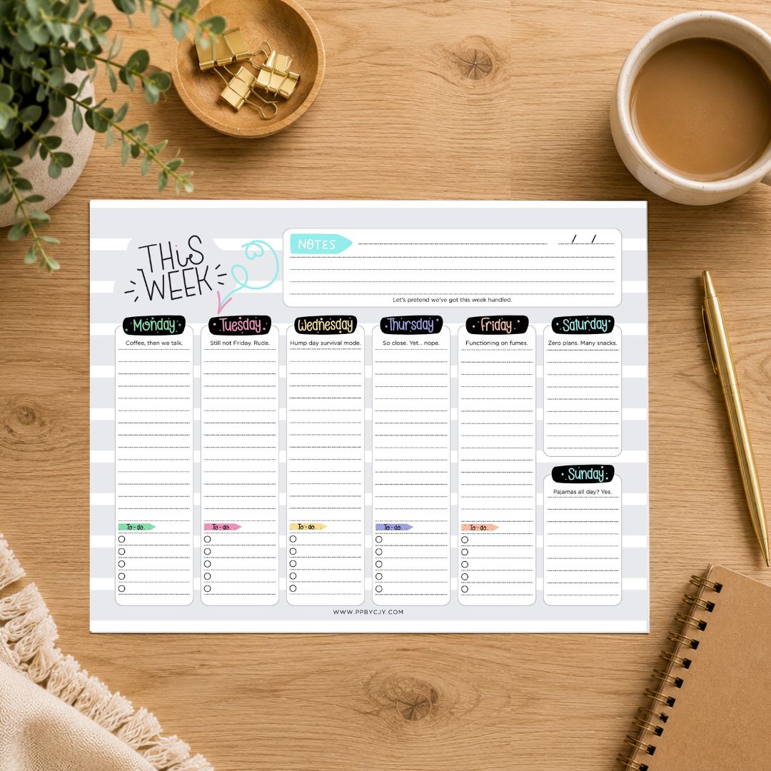 A weekly planner notepad sheet laid flat on a wooden desk, surrounded by a coffee cup, notebook, pen, and small plant. The notepad has sections for notes, monthly overview, and daily planning from Monday to Sunday.