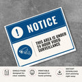 Printable This Area Is Under 24 Hour Video Surveillance sign featuring a professional blue notice design, security camera icon, and surveillance message for retail stores, offices, warehouses, parking areas, and commercial properties.