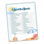 Beach-themed 'I Spy' game sheet with illustrations of a sun, umbrella, and sandcastle on a white background.
