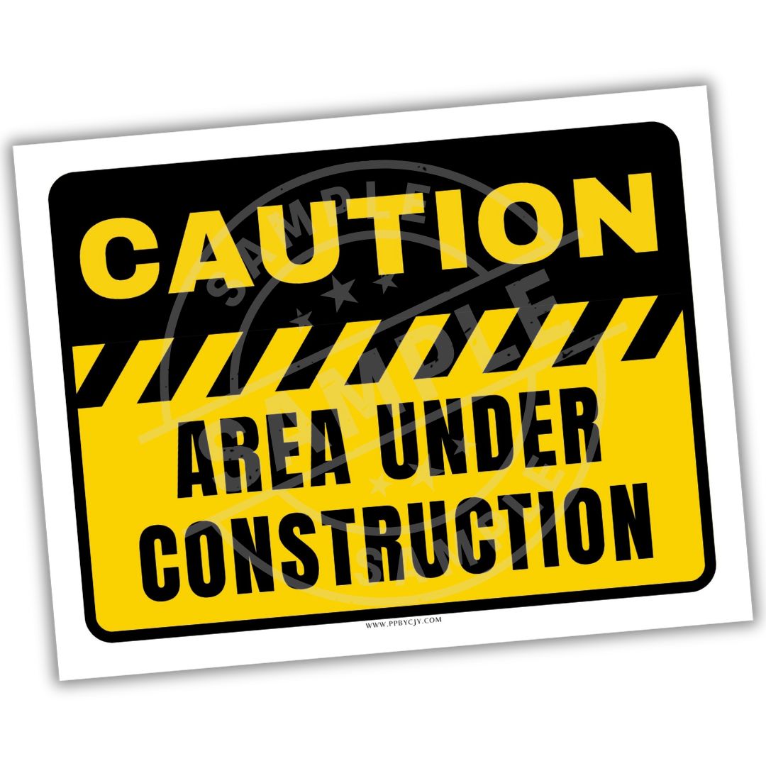 Caution sign indicating 'Area Under Construction' with yellow and black colors.