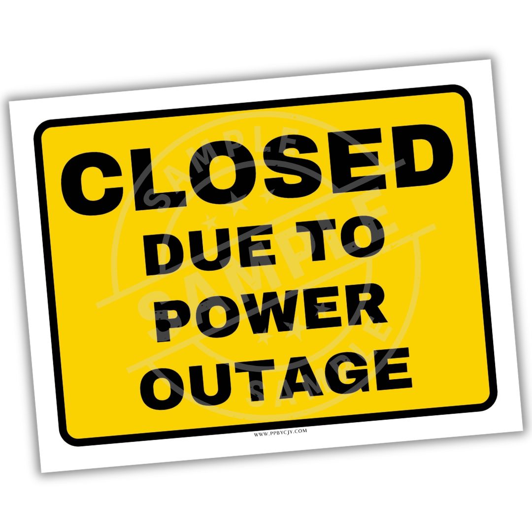Yellow sign with 'Closed Due to Power Outage' text on a white background