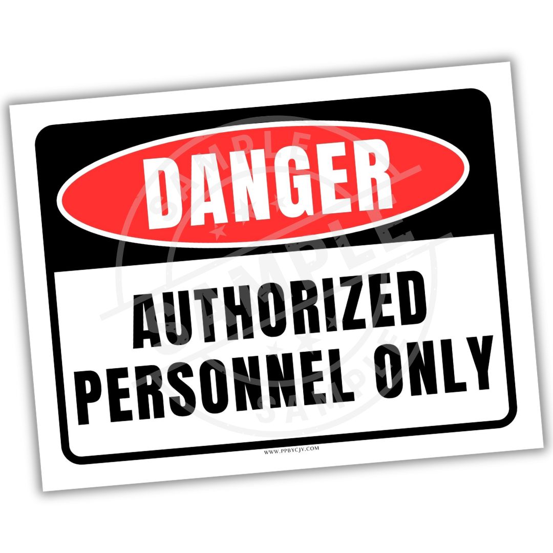 Danger - authorized personnel only sign with red border and white text