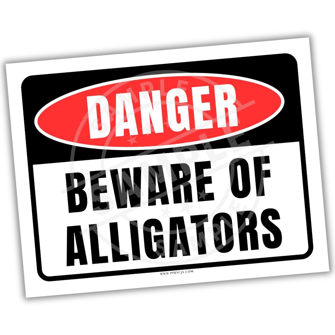 Warning sign with 'Danger - Beware of Alligators' text on a white background