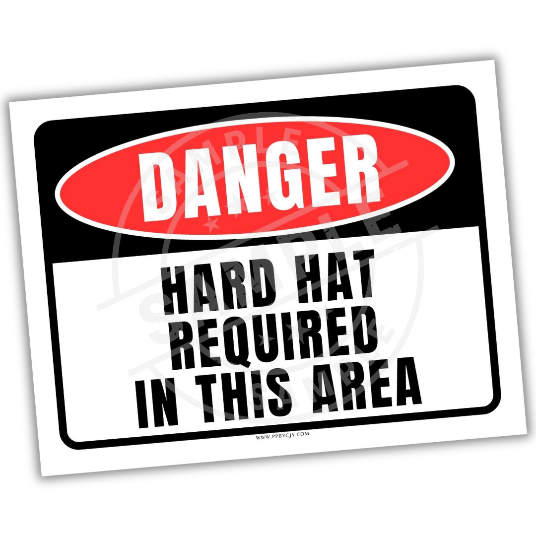 Warning sign with 'Danger Hard Hat Required in This Area' text on a white background