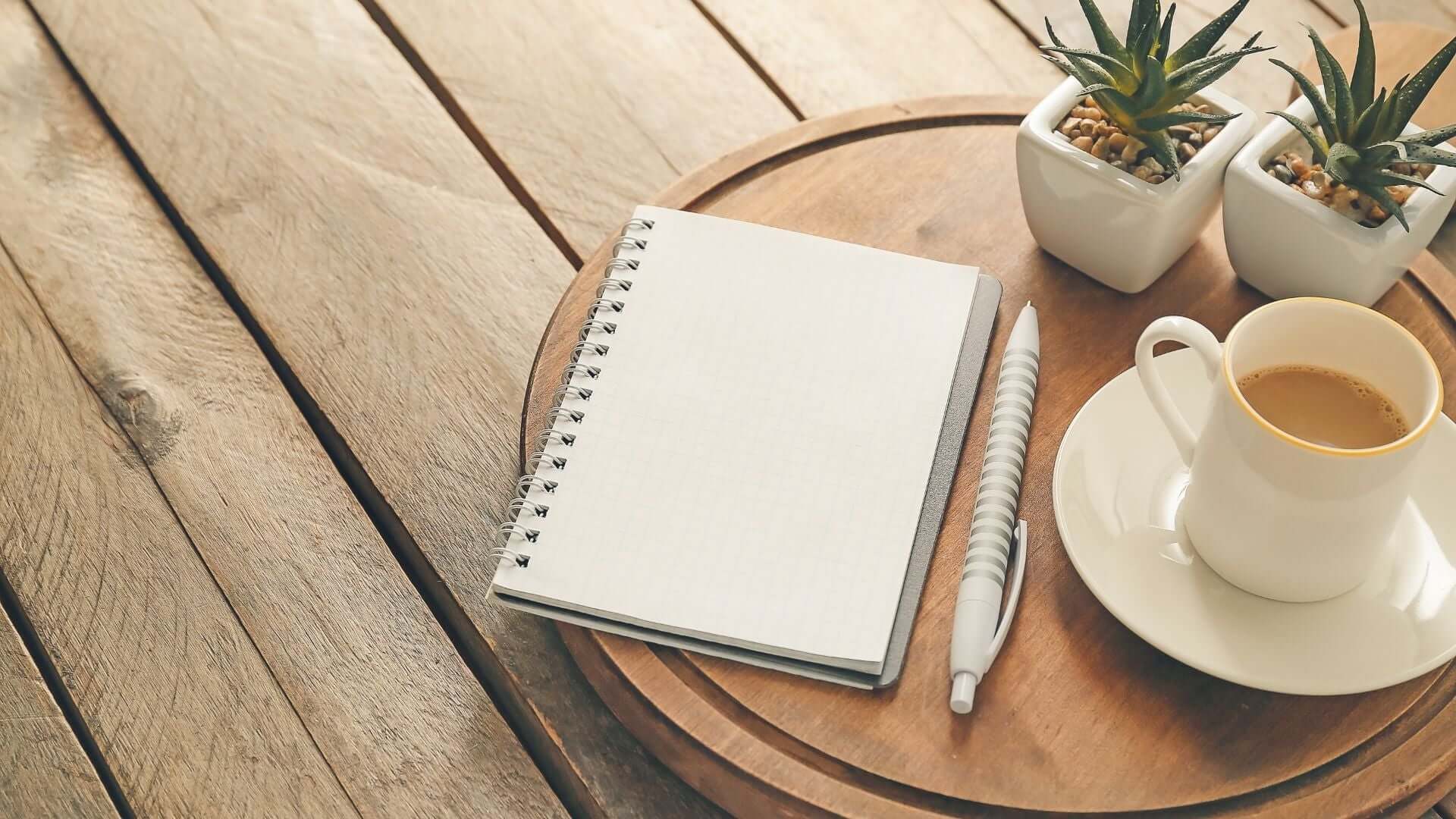 Planner and notebook on a desk