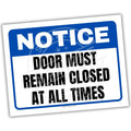 Notice sign with text 'DOOR MUST REMAIN CLOSED AT ALL TIMES' on a white background