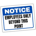 Notice sign with text 'Employees Only Beyond This Point' on a white background