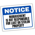Notice sign with text 'Management is not responsible for lost or stolen property' on a white background