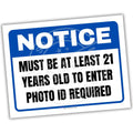 Notice sign indicating a minimum age requirement of 21 years with photo ID required.