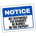 Notice sign stating 'Not responsible for accidents or injuries on this property' with a blue border.