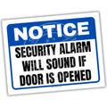 Notice sign with text 'Security alarm will sound if door is opened' on a white background