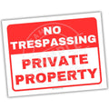 No Trespassing Private Property sign with red and white text on a white background